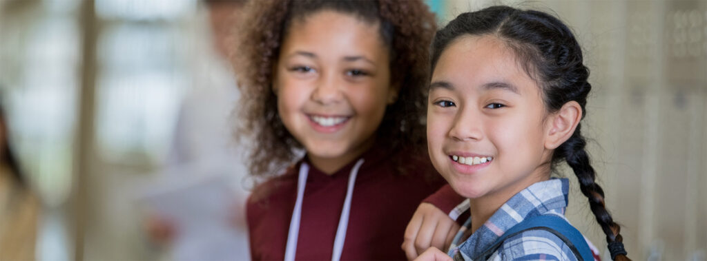 two students smiling