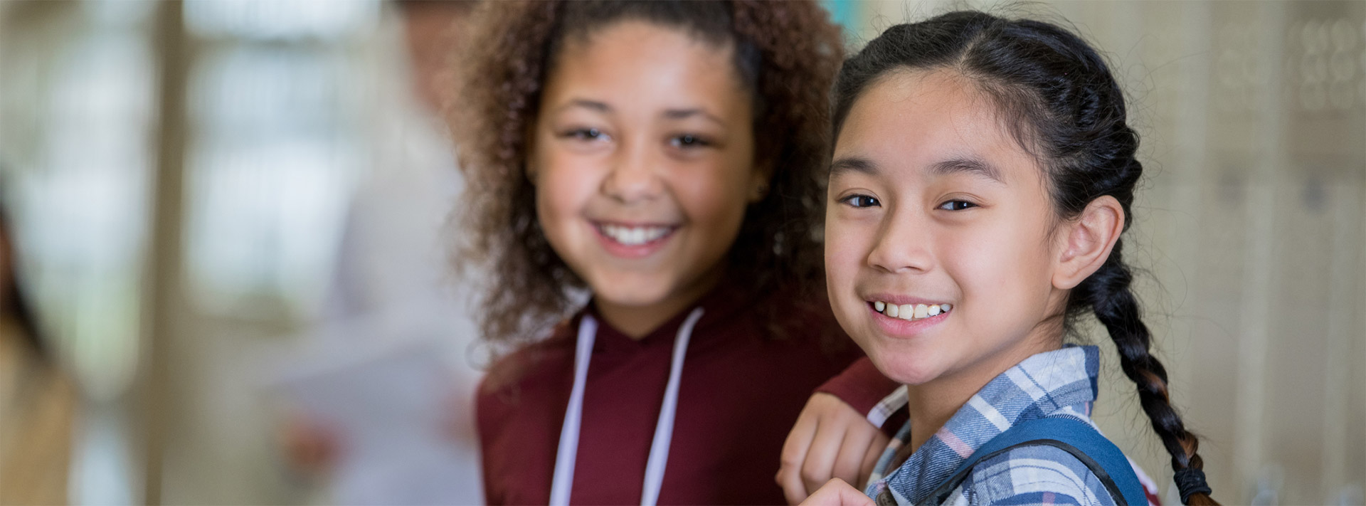 two students smiling